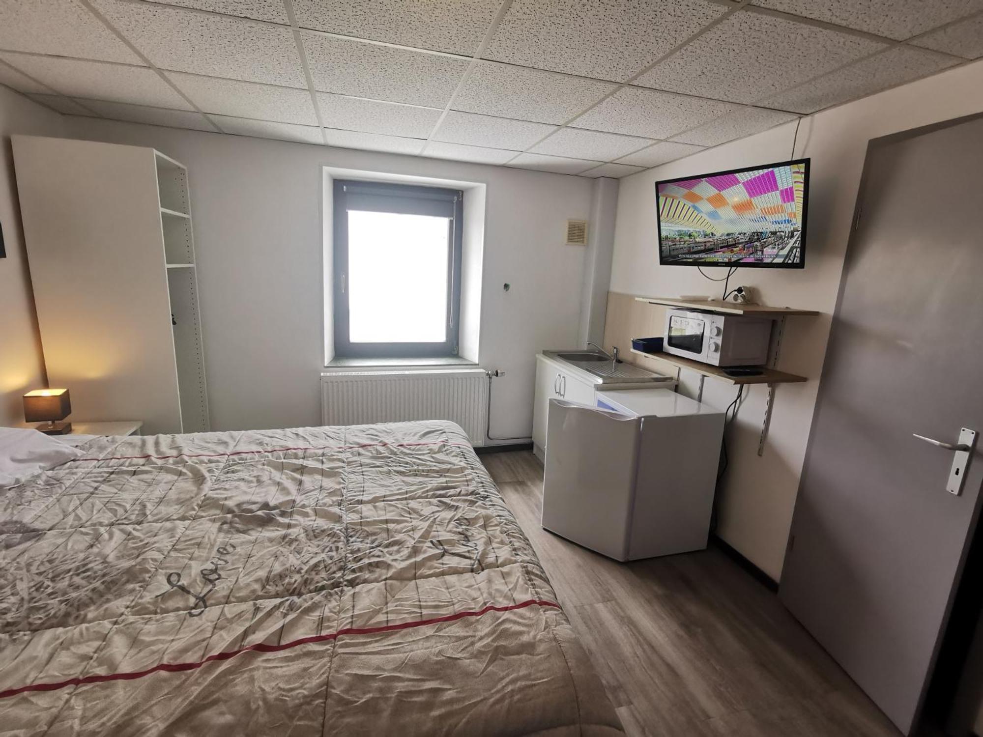 Hotel Chez Phil Robertville Habitación foto